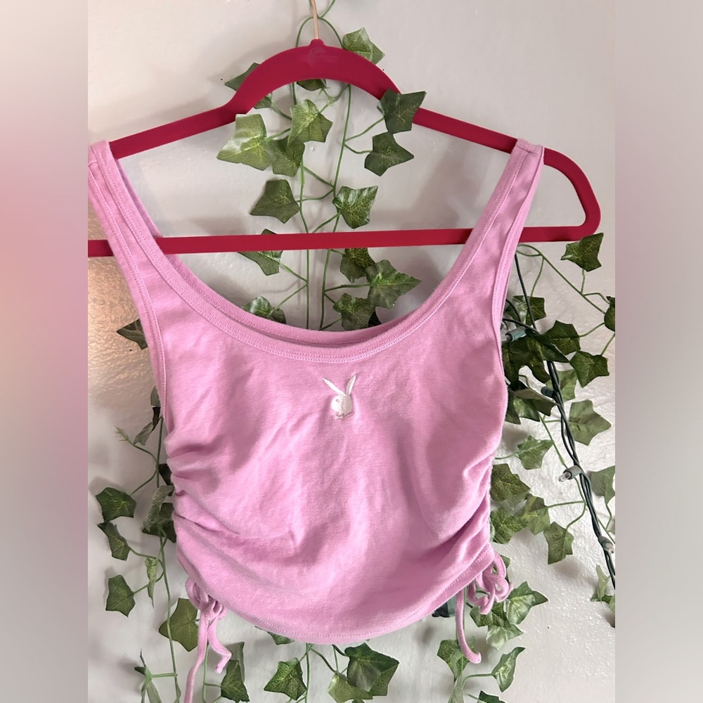 A cute but simple light pink Playboy tank💕